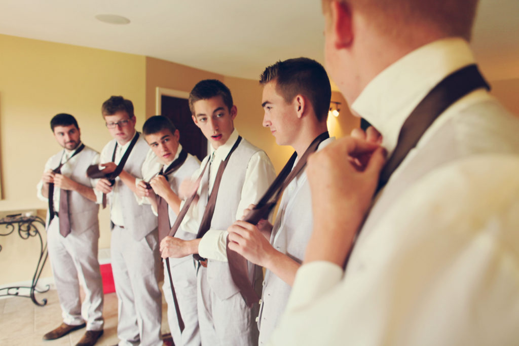 groomsmen getting ready rustic barn wedding